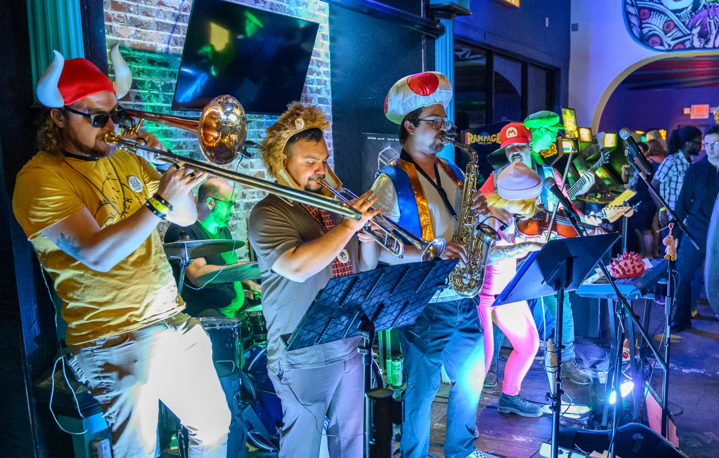 Tampa’s video game-inspired ska band plays an arcade anniversary concert—and cover includes unlimited game play